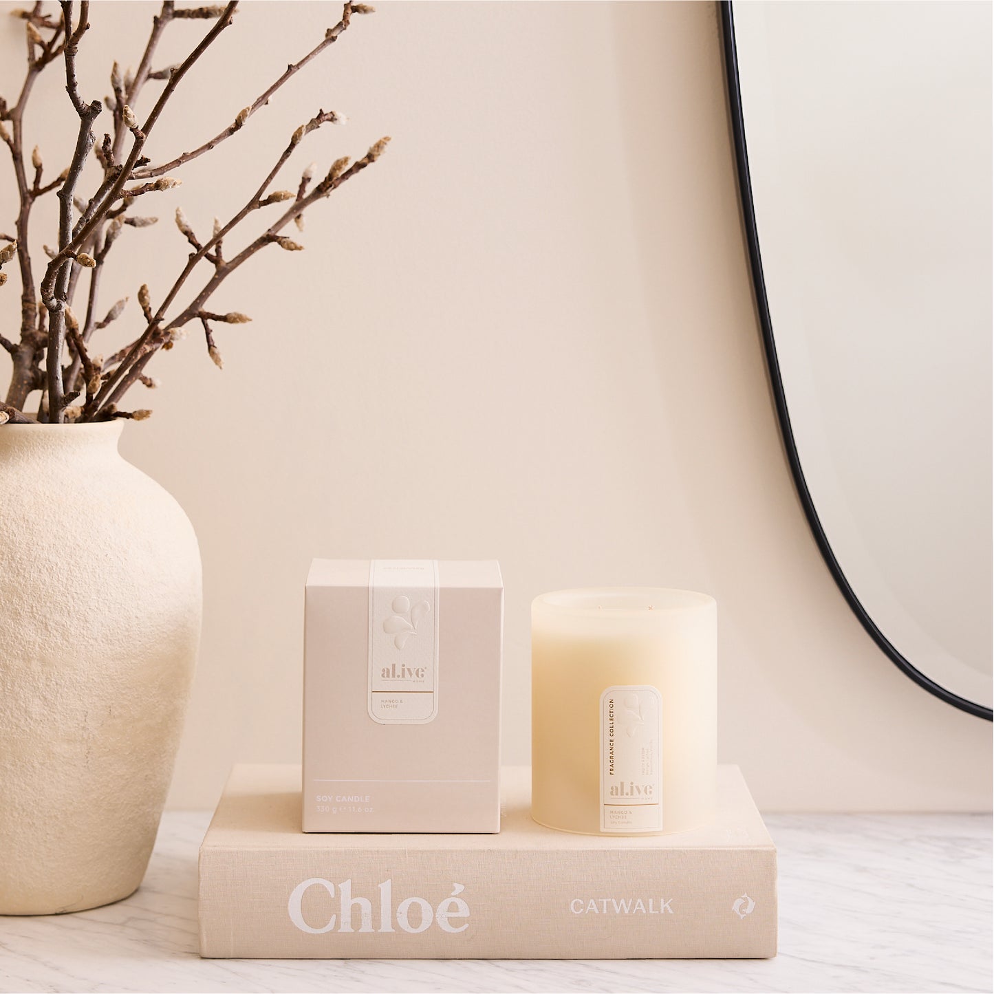 al.ive soy candle - mango & lychee